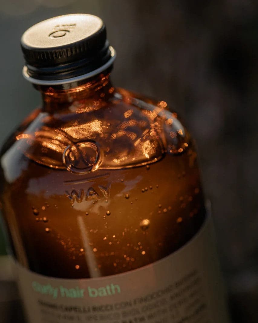 OWAY organic hair care products in sustainable glass packaging